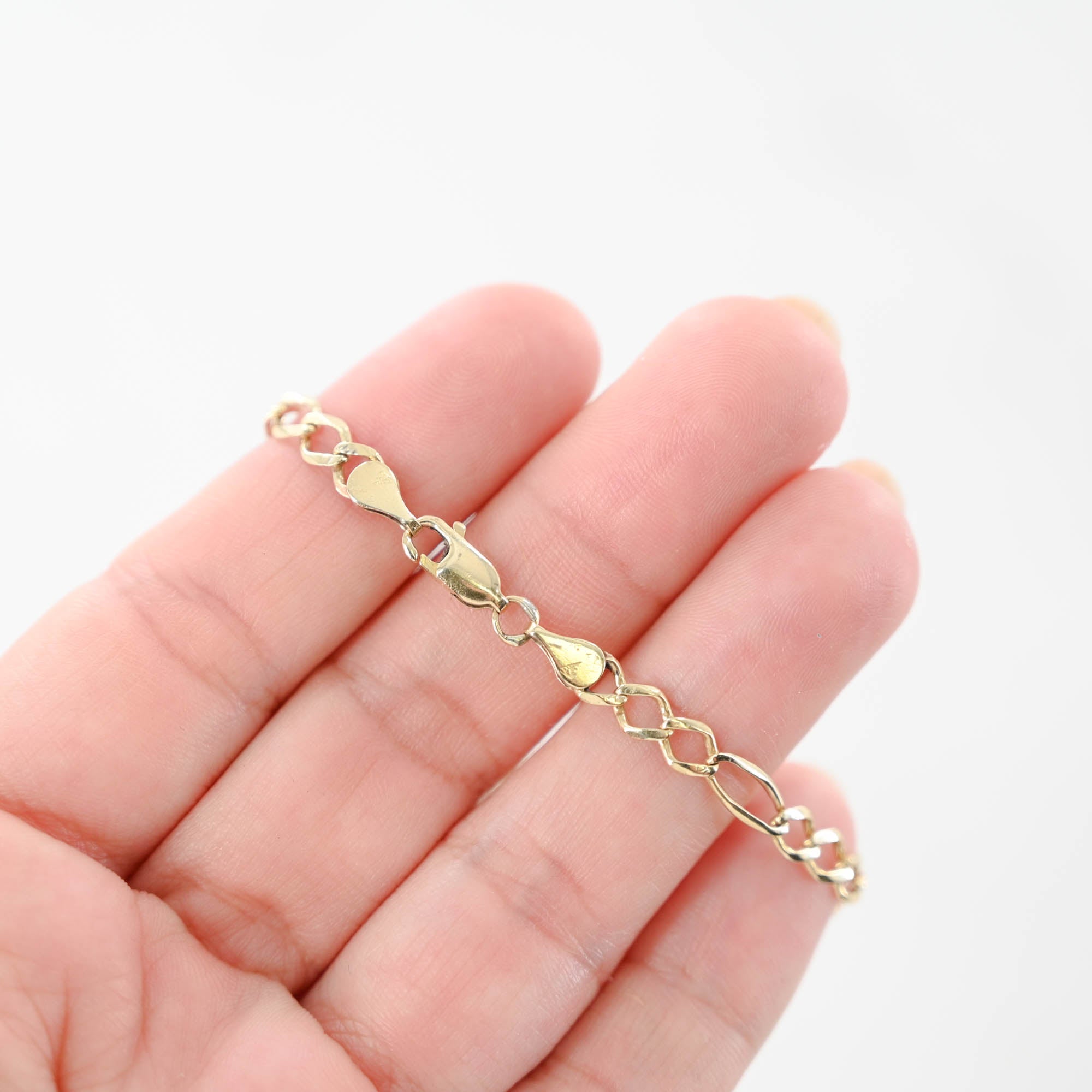 were-making-it-easy-to-buy-and-sell-14k-yellow-gold-figaro-id-bracelet-perfect-for-small-wrists-or-kids-online-sale_5.jpg