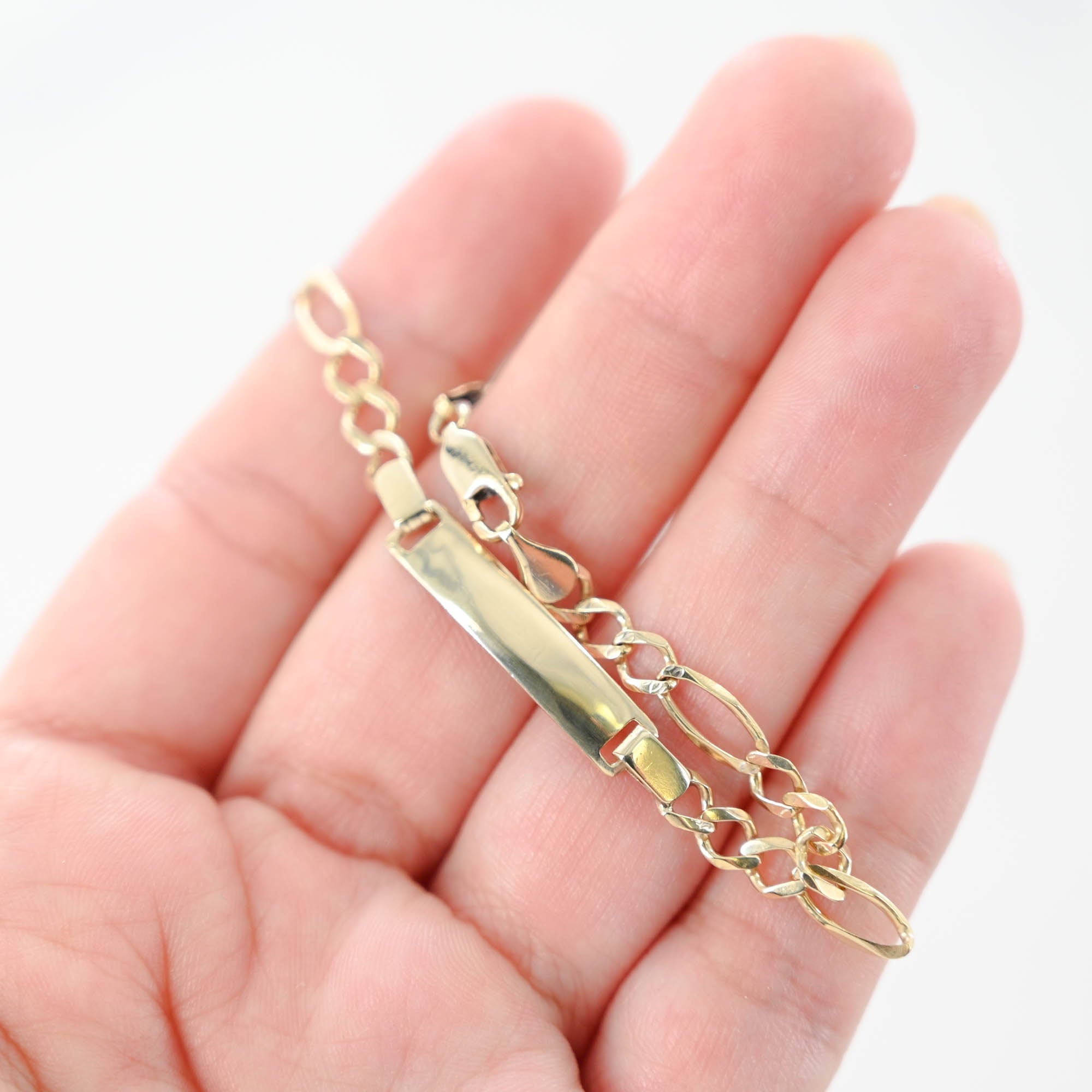 were-making-it-easy-to-buy-and-sell-14k-yellow-gold-figaro-id-bracelet-perfect-for-small-wrists-or-kids-online-sale_7.jpg