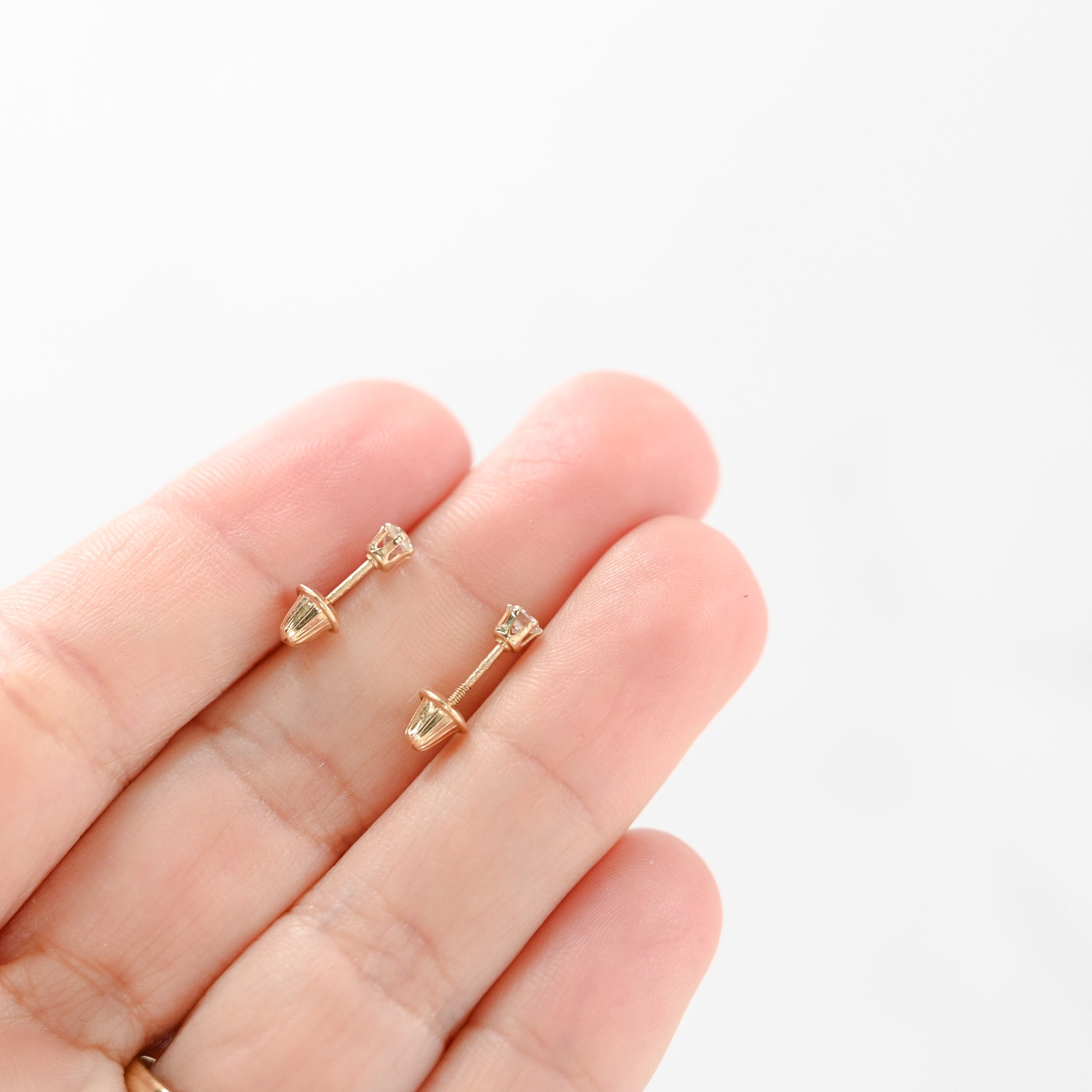 we-offer-the-lowest-prices-on-14k-yellow-gold-cubic-zirconia-tiny-dainty-studs-sale_4.jpg